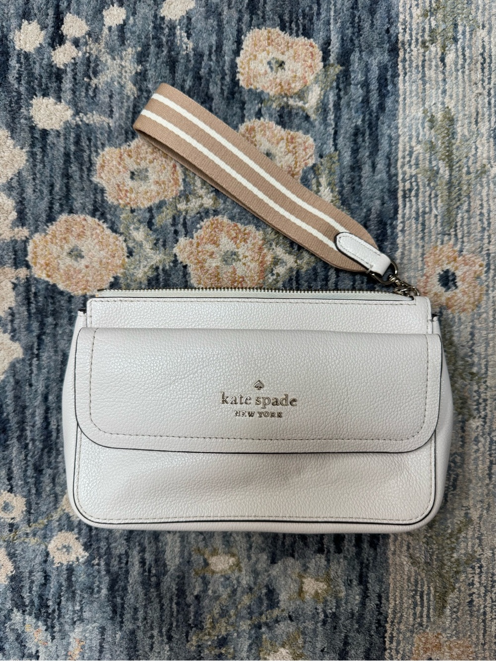 kate spade white leather wristlet with tan striped strap